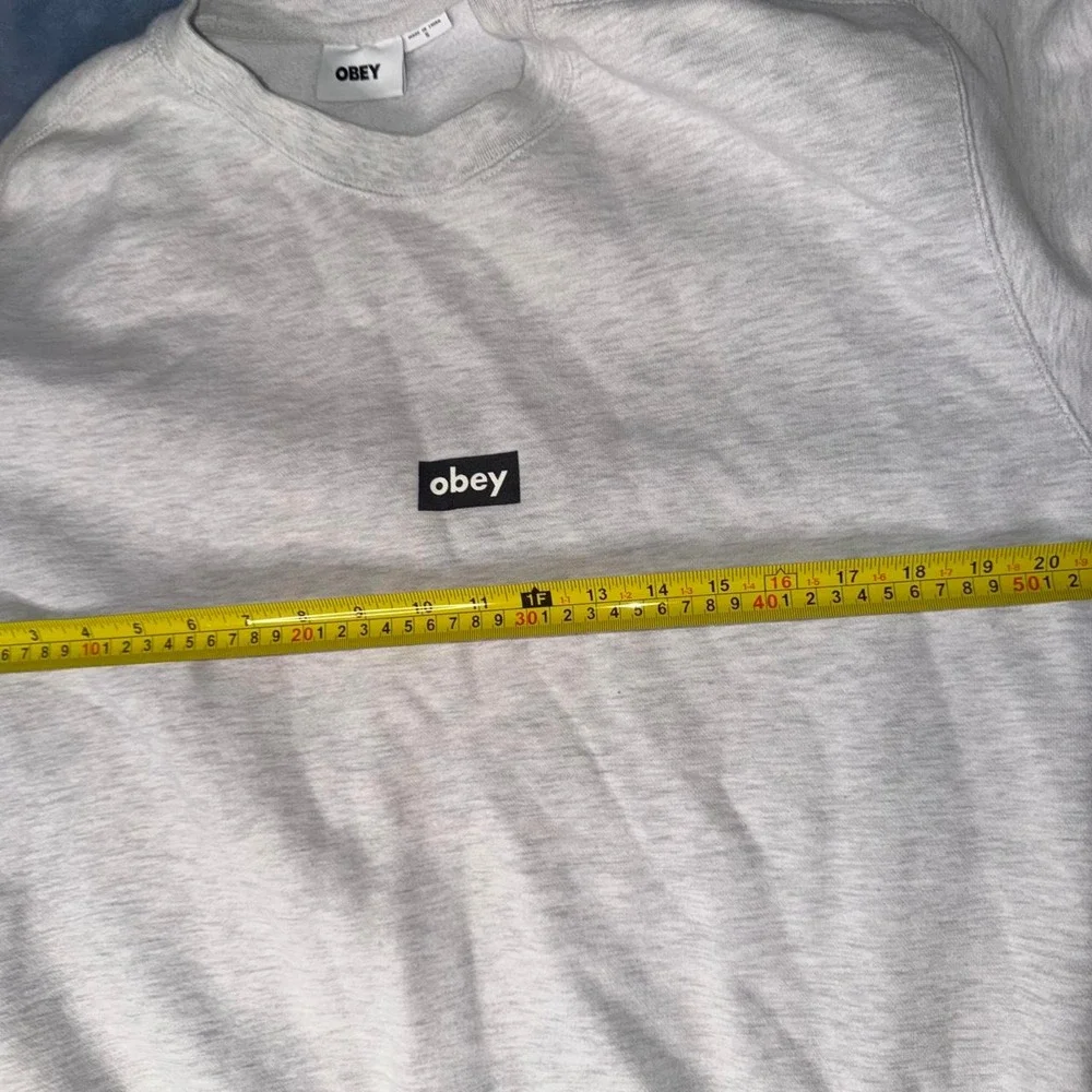 Gray Obey crewneck sweatshirt